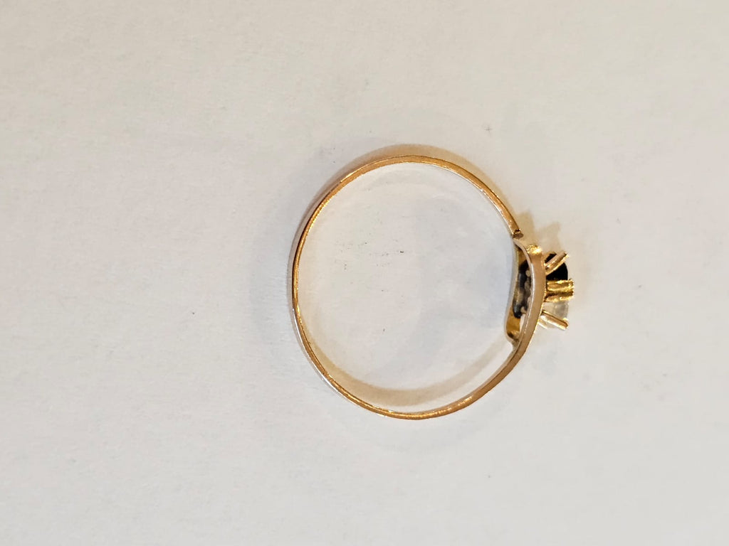 Anillo con zafiro y circón